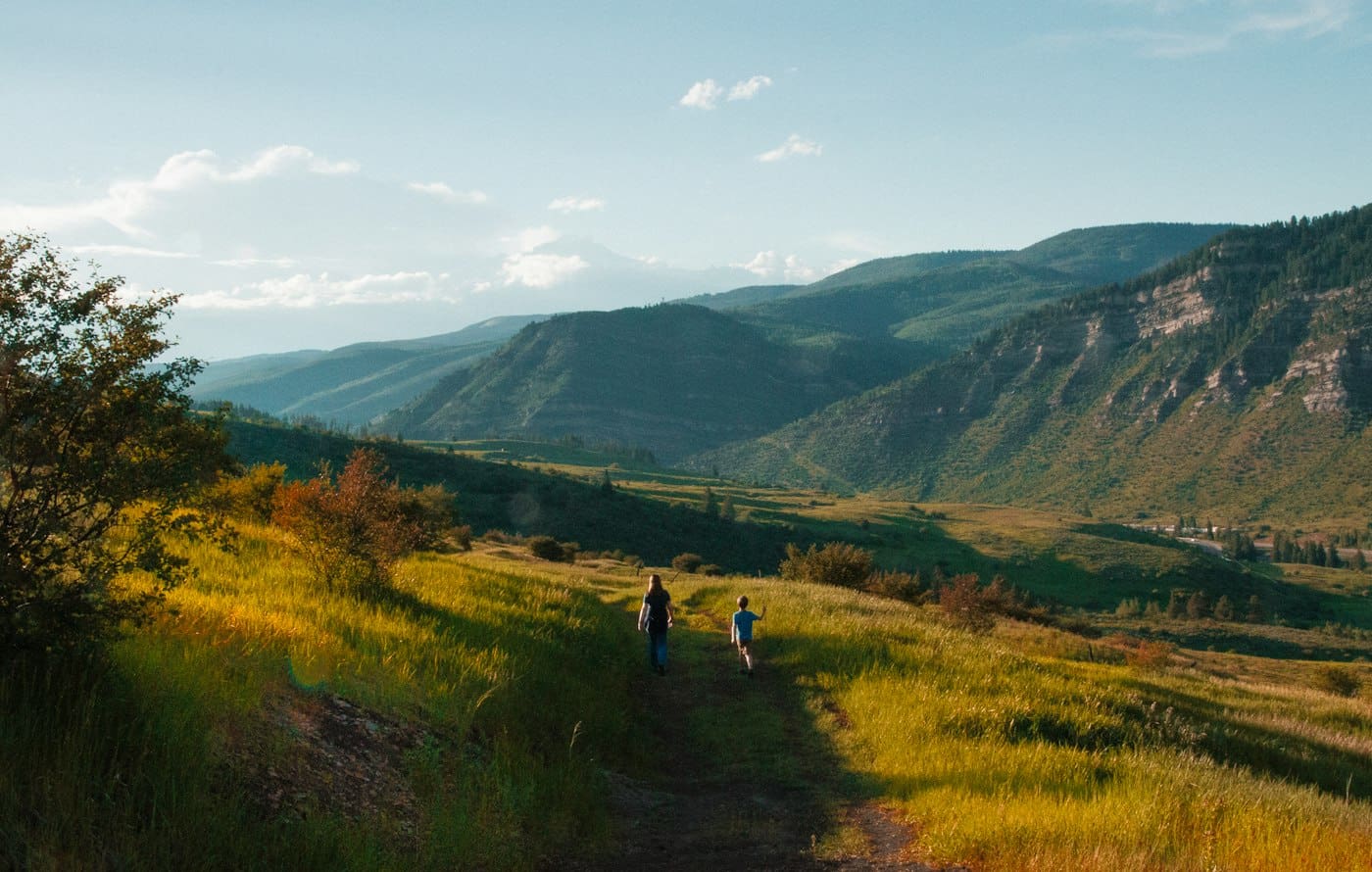 Dad and son on a mountain hill, Colorado