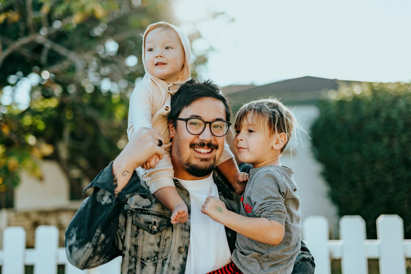 Dad carrying daughter